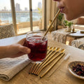 HP-AI-lifestyle Premium Stainless Steel Reusable Straw — add another lifestyle image for the gold color set